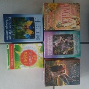 4 tarot decks and 1 Oracle deck